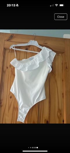 white bodysuit