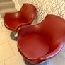Pair of vintage red swivel egg chairs Image 2