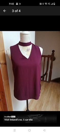 New look wine sleeveless top with choker neck. And zip opening at the back. size 8. Bust 18" length 24" New with tags