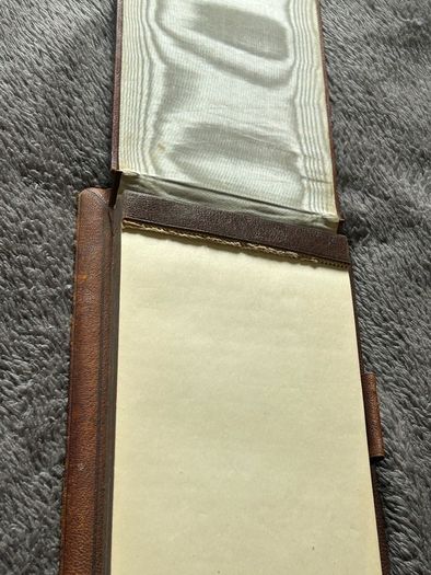 Silver vintage leather-bound notebook