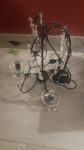 Black metal chandelier with crystal droplets