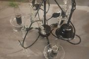 Black metal chandelier with crystal droplets