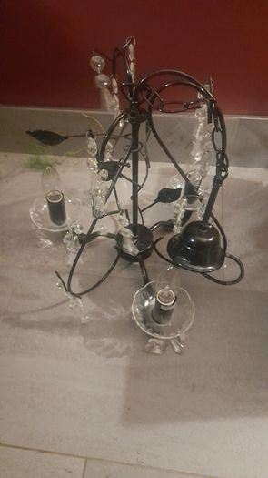 Black metal chandelier with crystal droplets