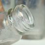 489 - Set of 7 Vintage Clear Glass Screw Cork Top Collectible Decorative Bottles Image 7