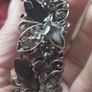 Beautiful flower cuff bracelet with rhinestones butterflies. Image 5