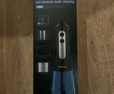 Oral irrigator