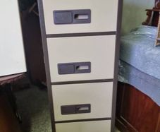 Four drawer metal filing cabinet