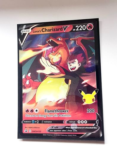 Official Pokemon TCG Lance's Charizard V SWSH133 Black Star Promo card from the Celebrations 25th Anniversary set.