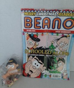 old beano comic and new toy in wrapping
