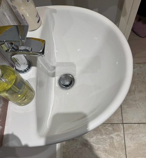 Bathroom sink, toilet, radiator