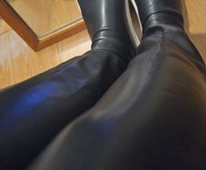Black leather Over the knee boots, flat no zipper.