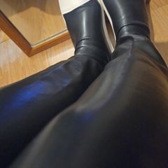 Black leather Over the knee boots, flat no zipper.