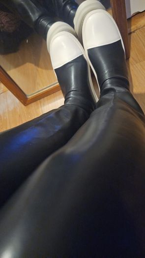 Black leather Over the knee boots, flat no zipper.