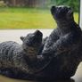 The figurine is a bears sculpture, manufactured by Wolf Originals in Canada. Image 3