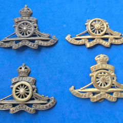 4 Royal Artillery cap badges, including officers
