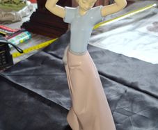 Getting Ready A Young Girl Fixing Her Hair from Nao Porcelain, Lladro, postage available or collection