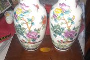 A Beautiful Pair of Old Chinese Porcelain Vases in a Colorful Floral and Butterfly Pattern possibly in the Famille Rose style, in nice condition
