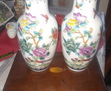 A Beautiful Pair of Old Chinese Porcelain Vases in a Colorful Floral and Butterfly Pattern possibly in the Famille Rose style, in nice condition