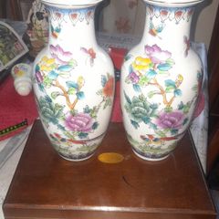 A Beautiful Pair of Old Chinese Porcelain Vases in a Colorful Floral and Butterfly Pattern possibly in the Famille Rose style, in nice condition