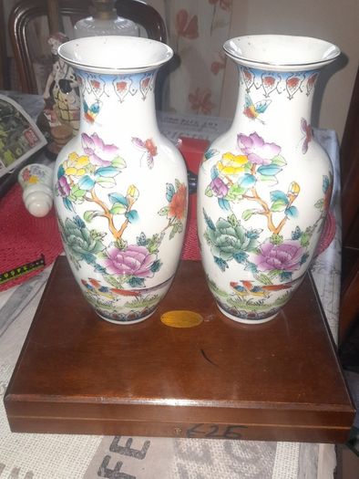 A Beautiful Pair of Old Chinese Porcelain Vases in a Colorful Floral and Butterfly Pattern possibly in the Famille Rose style, in nice condition