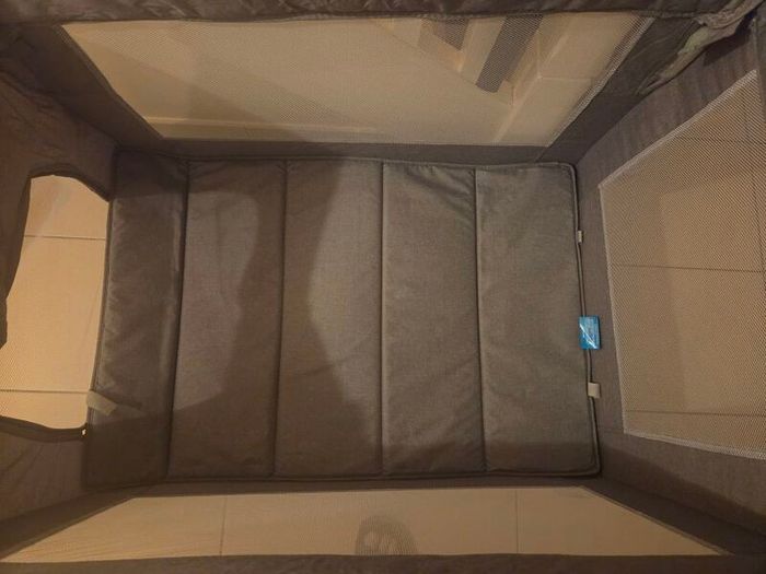 travel cot never used , will come with mattress