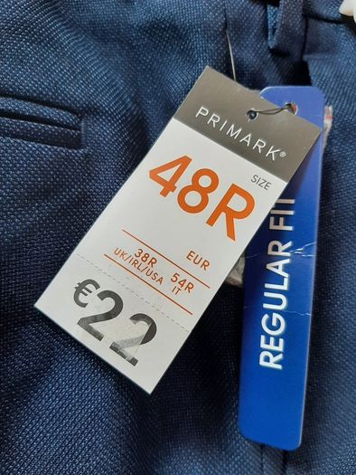 New navy trousers tag attached