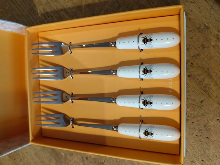 set of four Bee Dessert Forks is by Tipperary Crystal. new in box