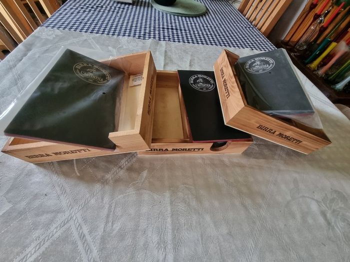 Eight wooden Birra Moretti boxes