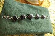 Silver bracelet with stones