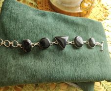 Silver bracelet with stones