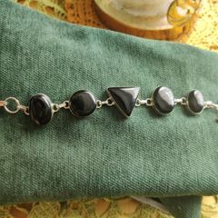 Silver bracelet with stones