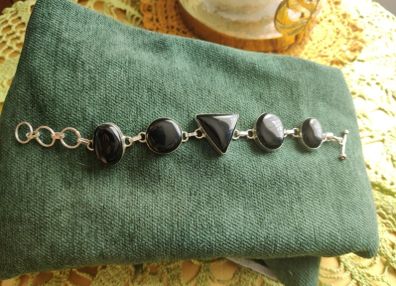 Silver bracelet with stones