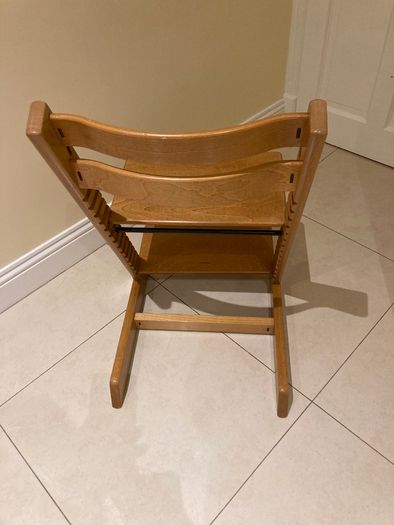 Child's height adjustable wooden chair