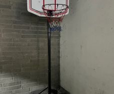Portable and adjustable basketball stand