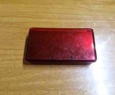 Nintendo 3DS Metallic Red with the original box, charger, and booklets
