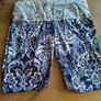 blue and white leggings with damask print with a white lace waistband. New never worn. Image 3