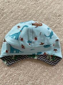 New - Handmade reversible dinosaur/ robot hat (approx 1-2yrs)