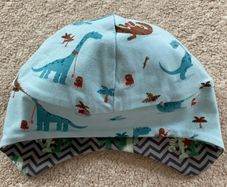 New - Handmade reversible dinosaur/ robot hat (approx 1-2yrs)