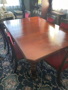 antique table and 6 velvet chairs