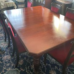 antique table and 6 velvet chairs