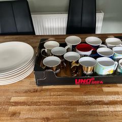 Assortment of Mugs and 7 Dinner plates