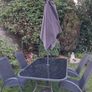 Garden table, chairs & parasol. Image 2