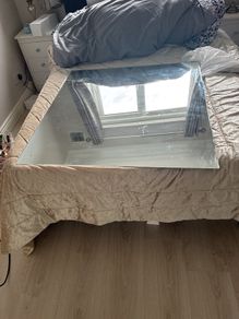 big rimless mirror that screw to wall. Have the 4 screws. In perfect condition. Box for transport