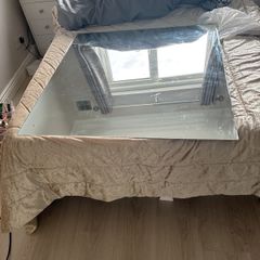 big rimless mirror that screw to wall. Have the 4 screws. In perfect condition. Box for transport