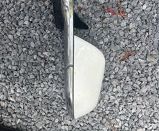 Tesla passenger wing