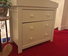 Wooden changing table with drawers