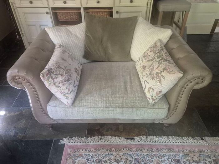 4 seater couch and 1 1/2 seater love couch...both Webb and Barker