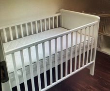 cot bed mattress + top changer