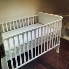 cot bed mattress + top changer