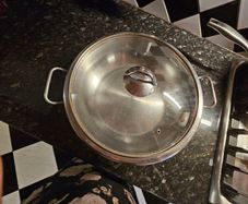 stainless steel wok and 3 serving platers